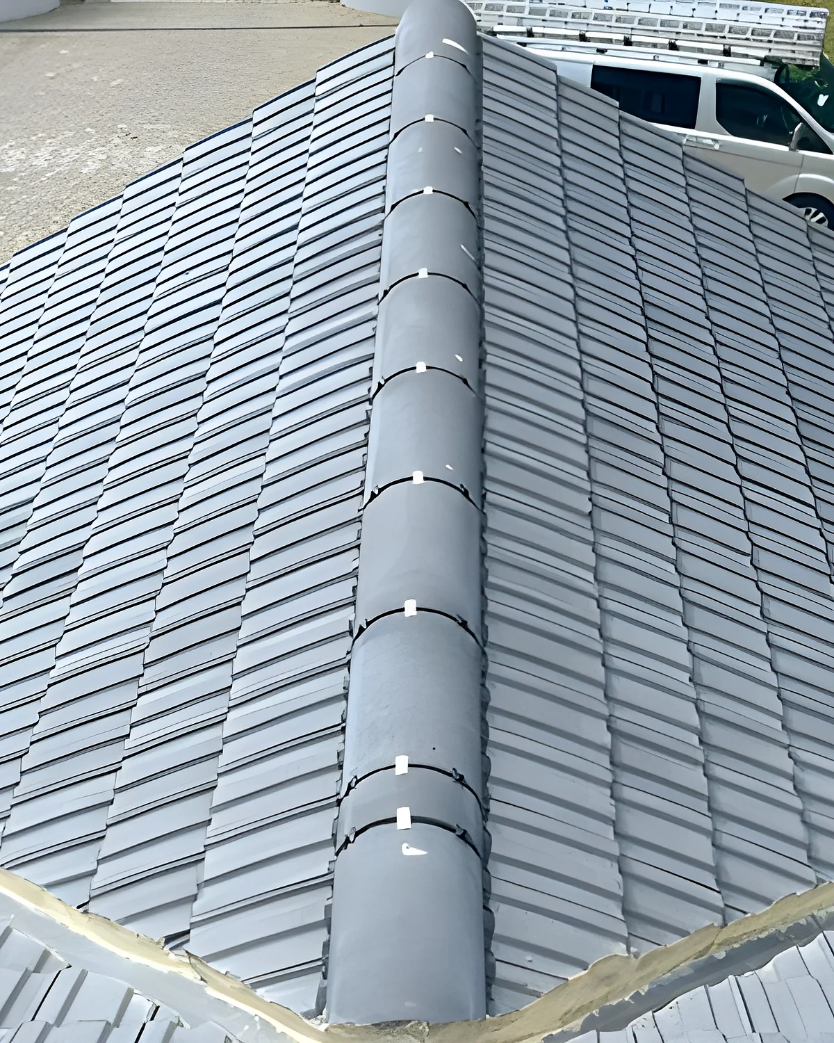 Roof stripped back to the rafters ahead of a repair