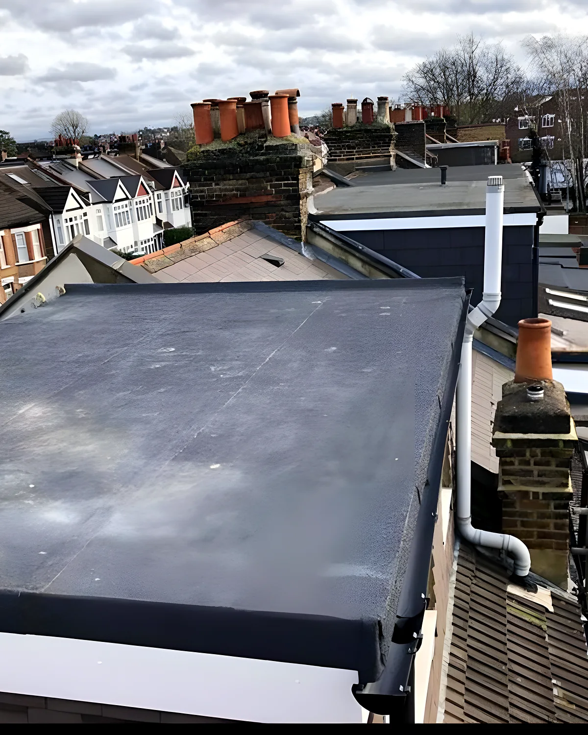 Completed hipped roof in natural slate