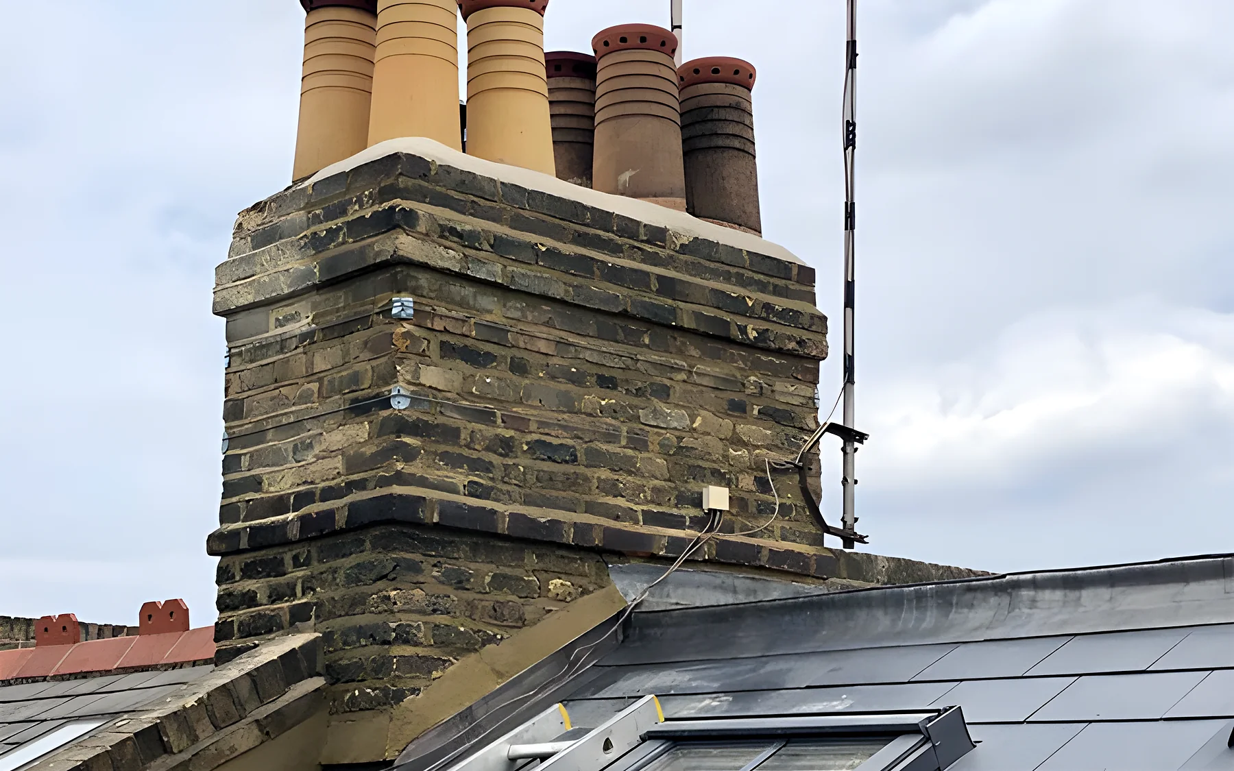 A chimney stack with new pots