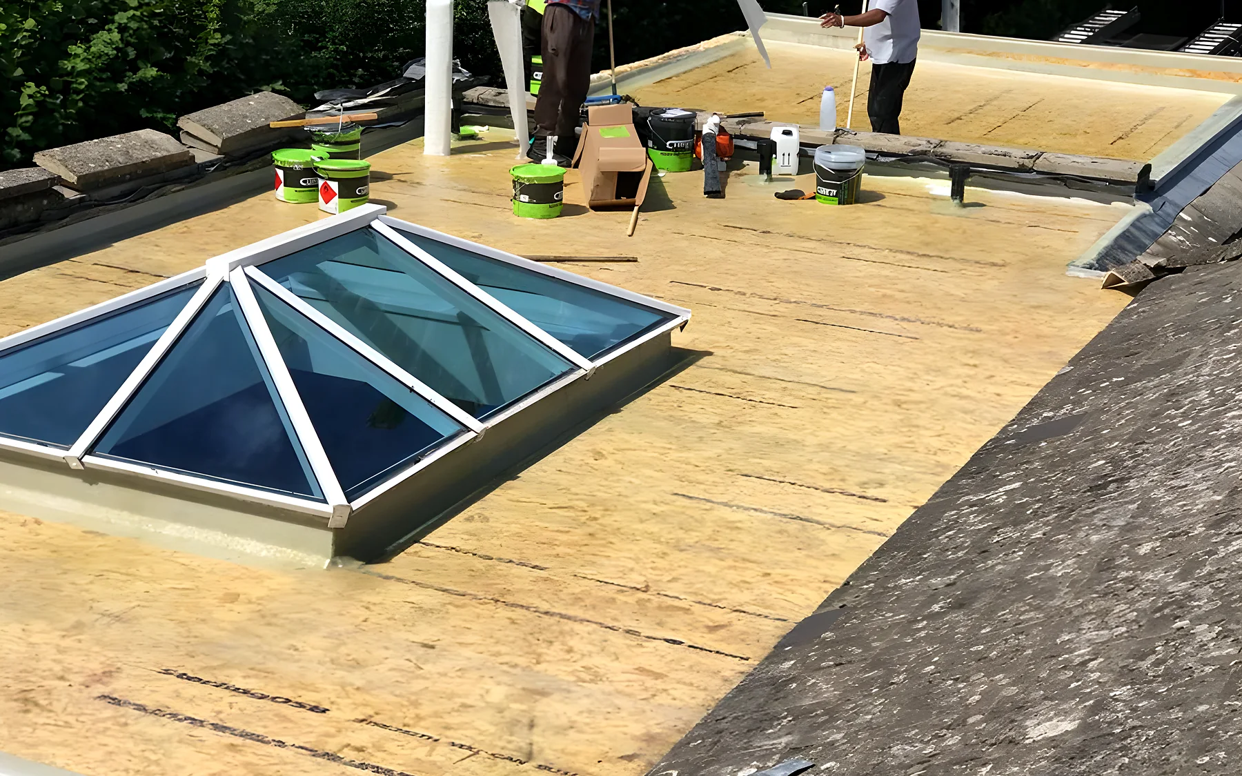 Our roofers preparing a large flat roof deck around a roof lantern