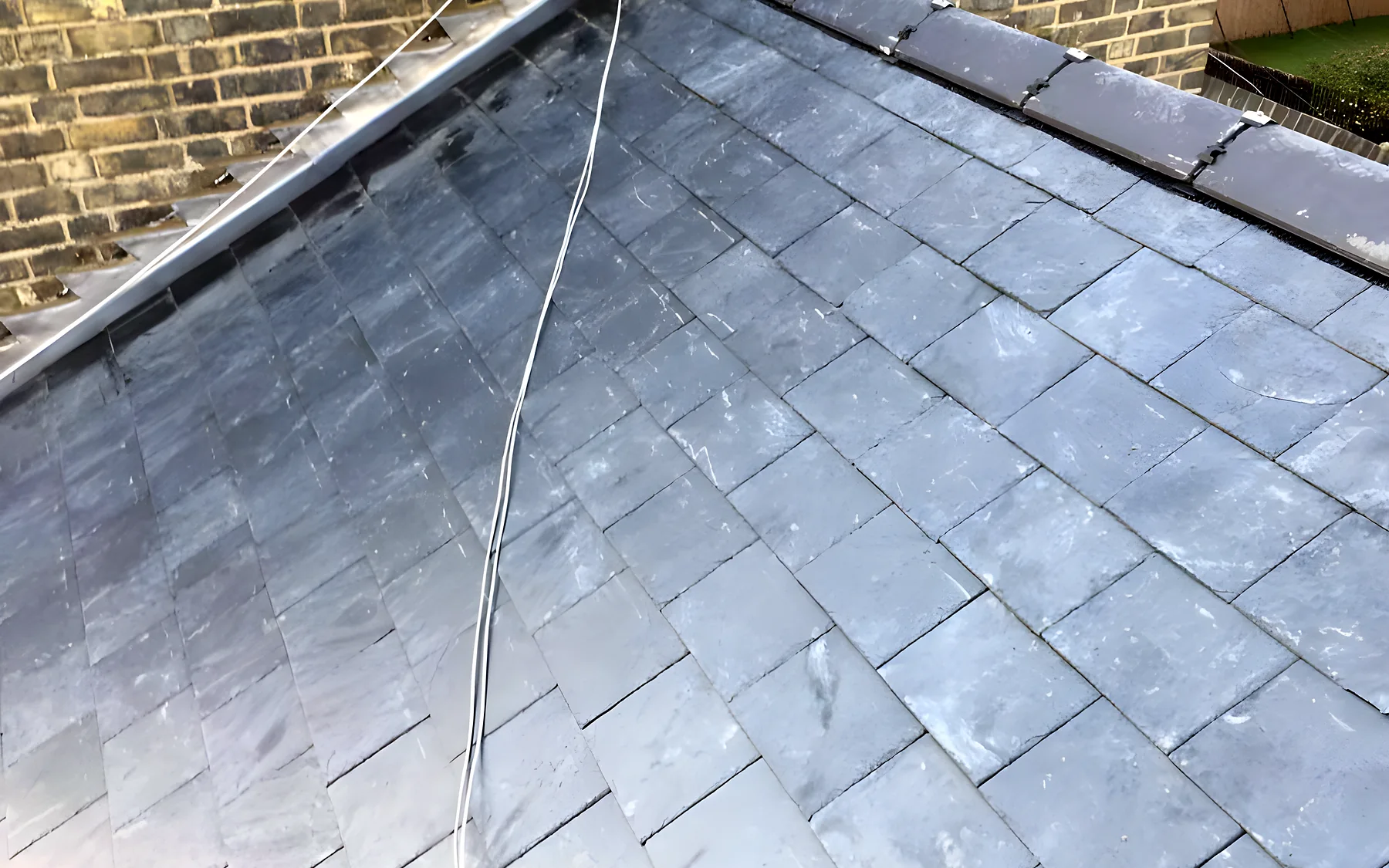 A hipped slate roof with new lead