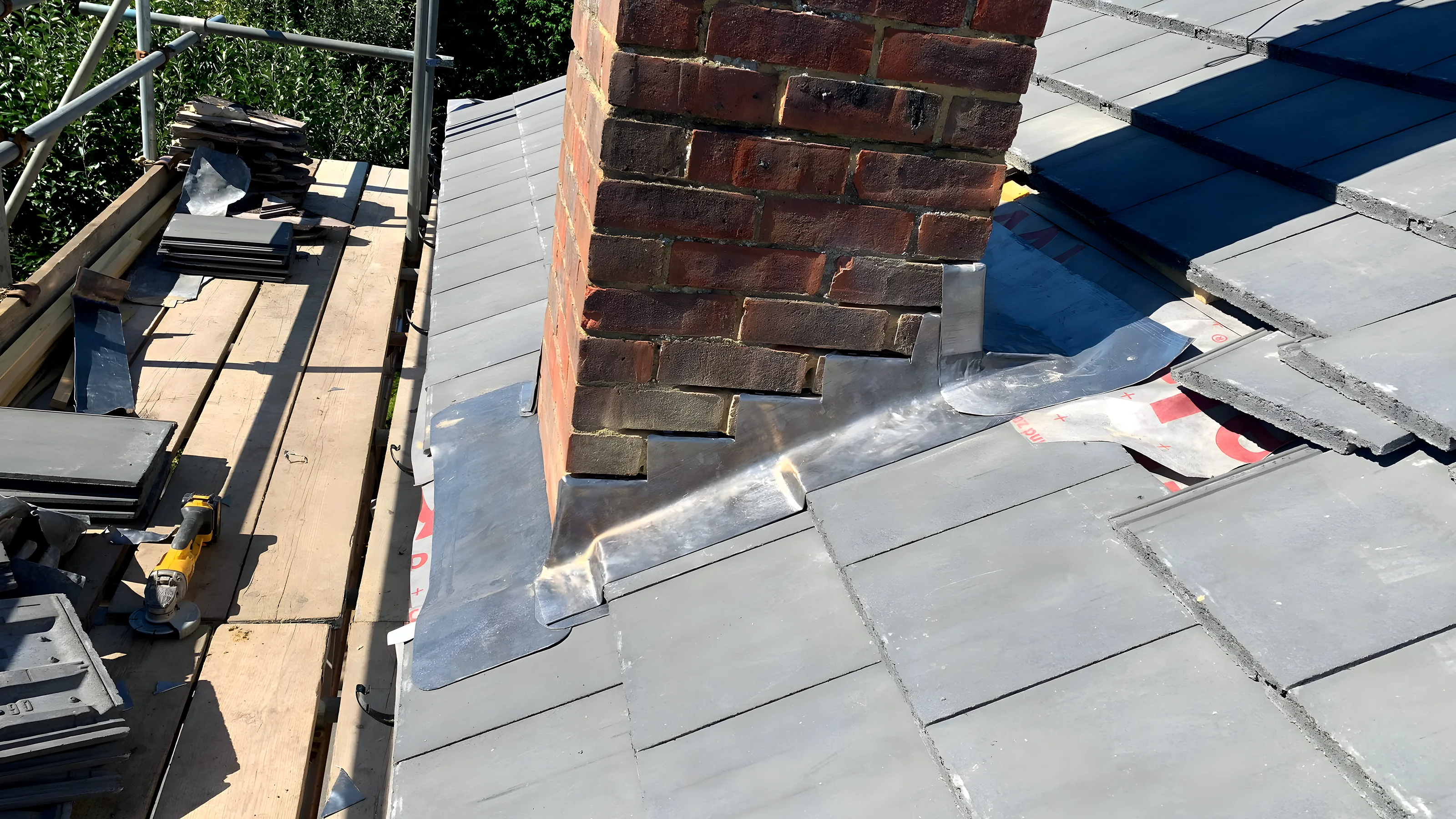 Natural slate roof with a new lead valley, the detail where most leaks start