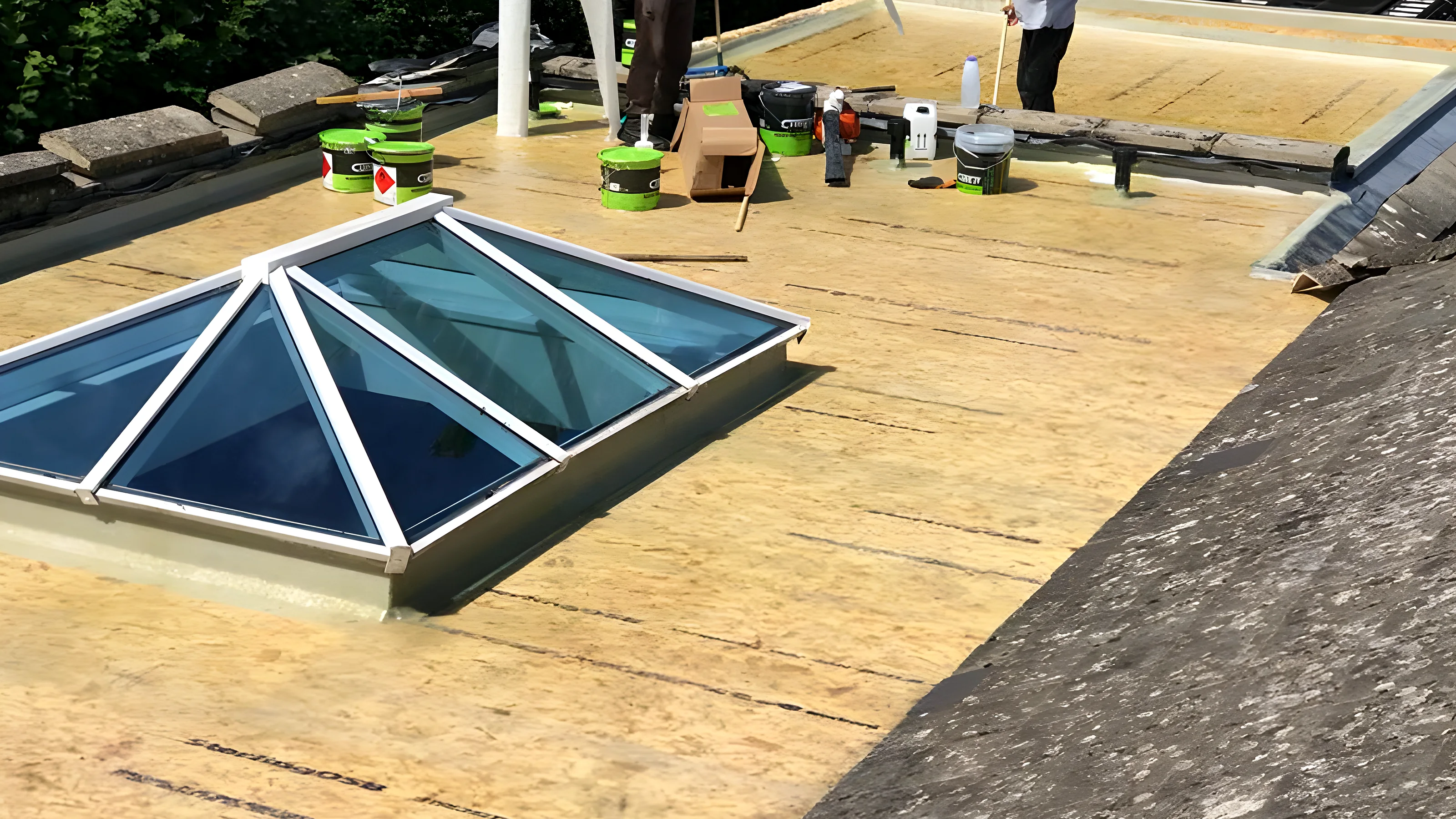 New grey GRP flat roof finished with a clean upstand and trim