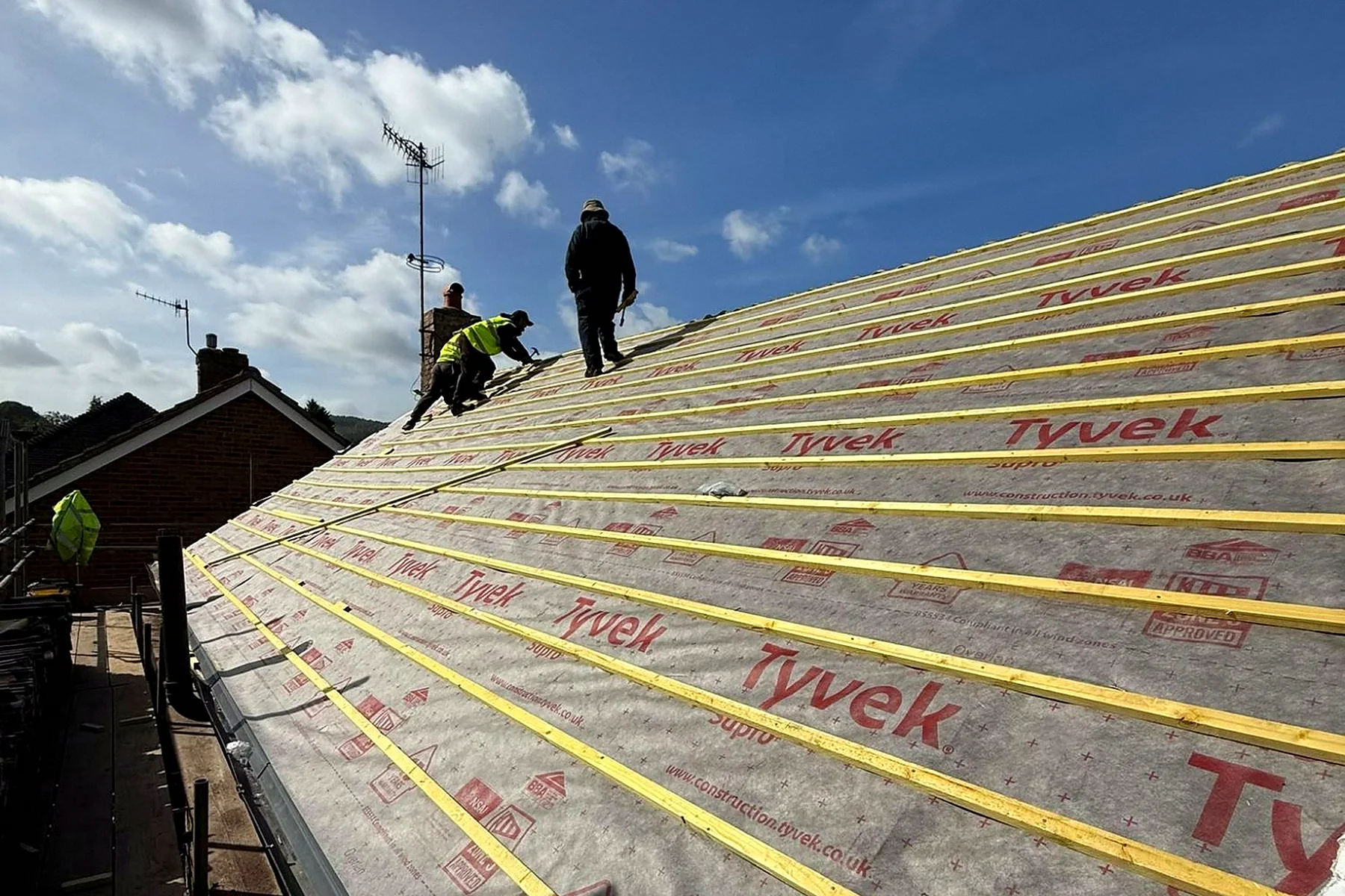 A breathable membrane laid over the rafters with new treated battens nailed over it