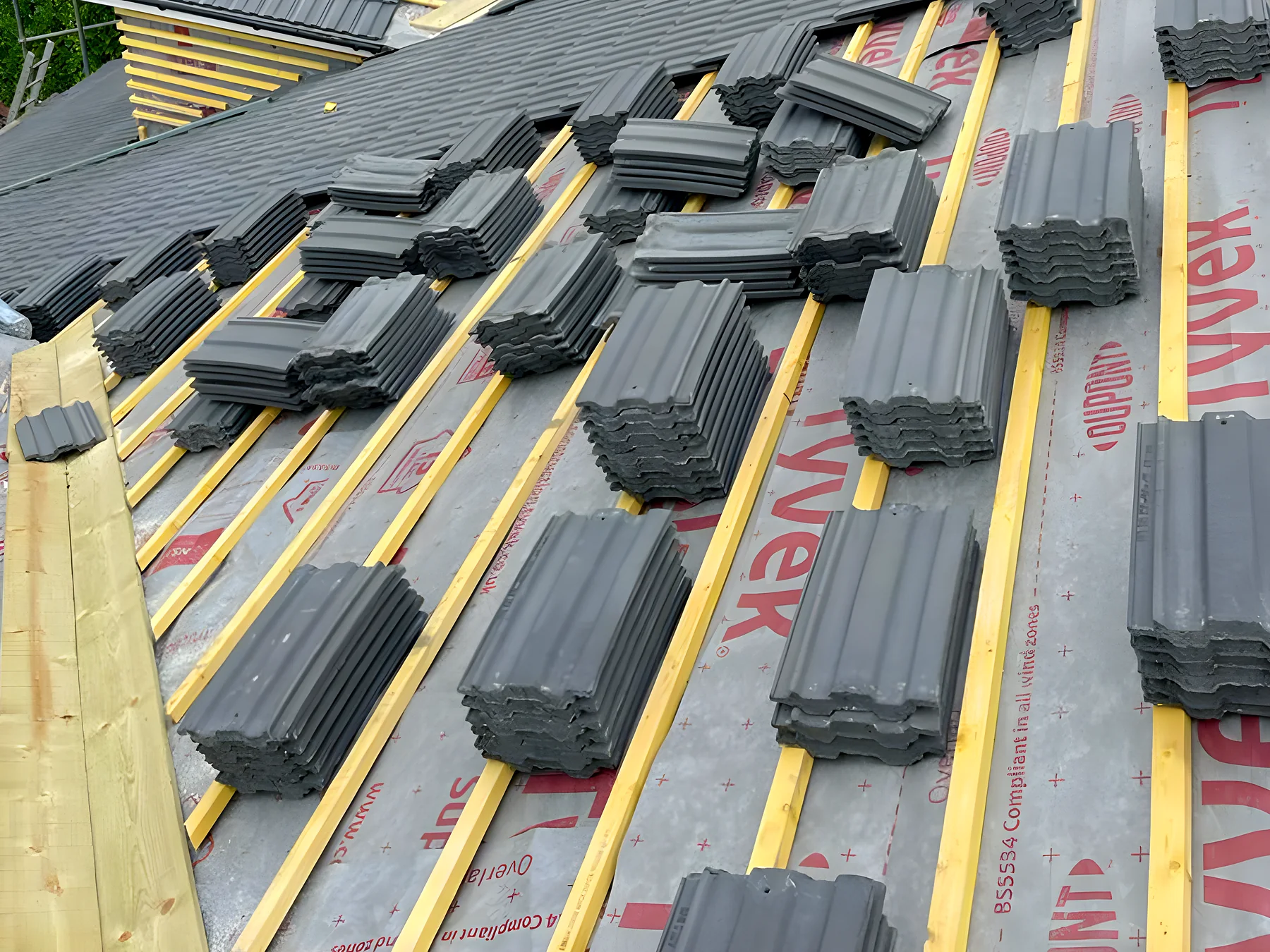 Tiles loaded out on new battens