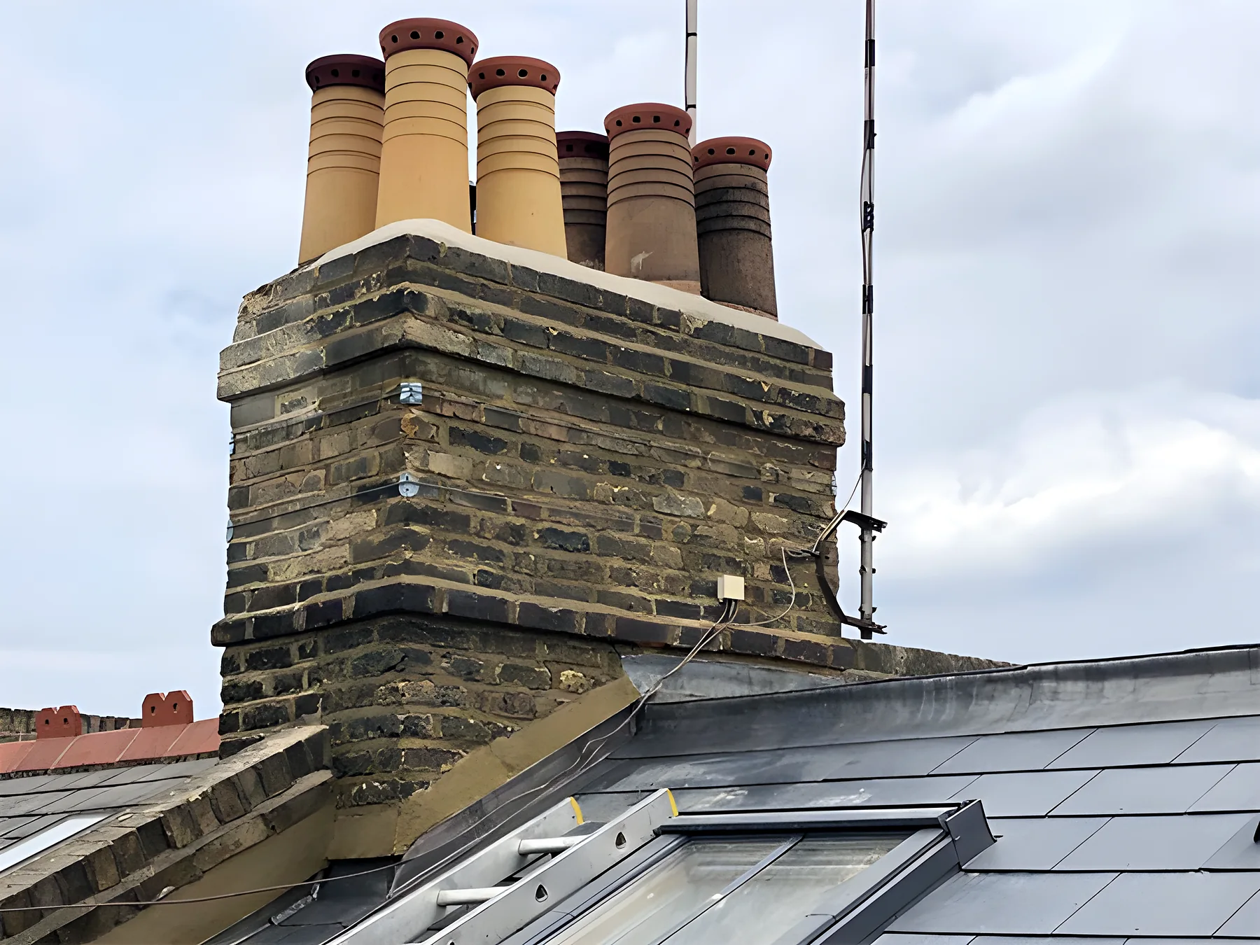 A chimney stack with new pots