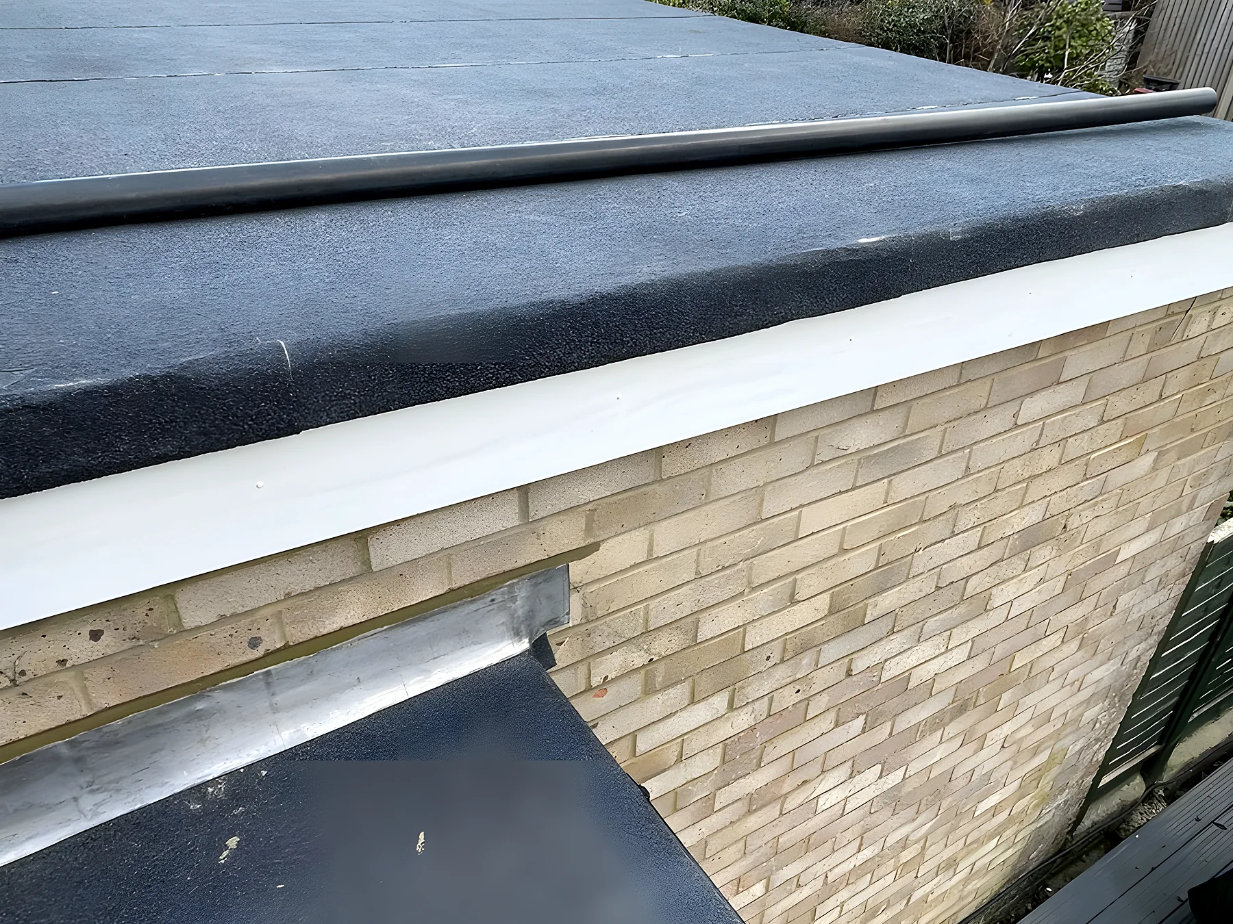 A finished flat roof with new edge trims