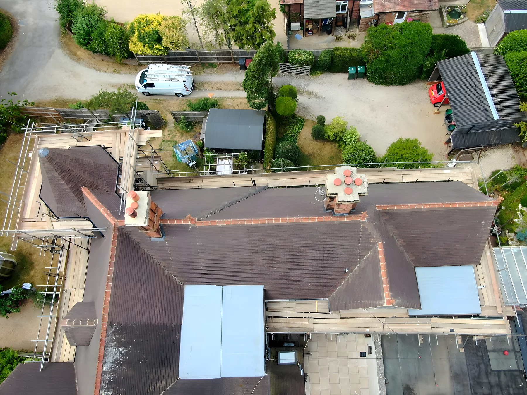 A re roofed Victorian house photographed straight down from a drone