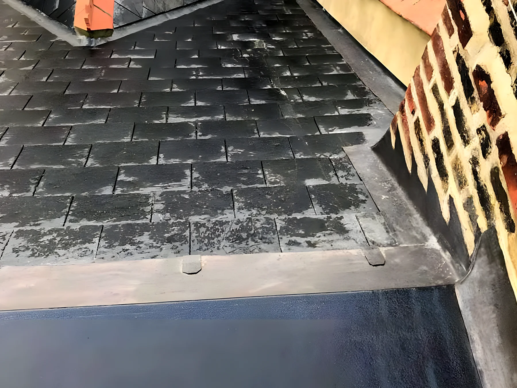 Old slates and lead on a period roof