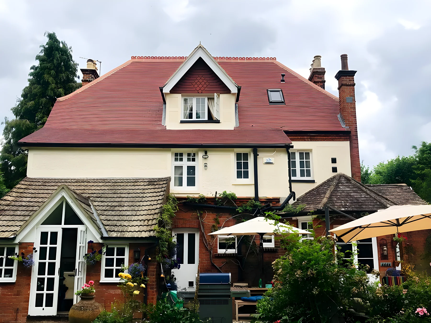 Period house with a red clay tiled roof, the kind of roof a survey looks over